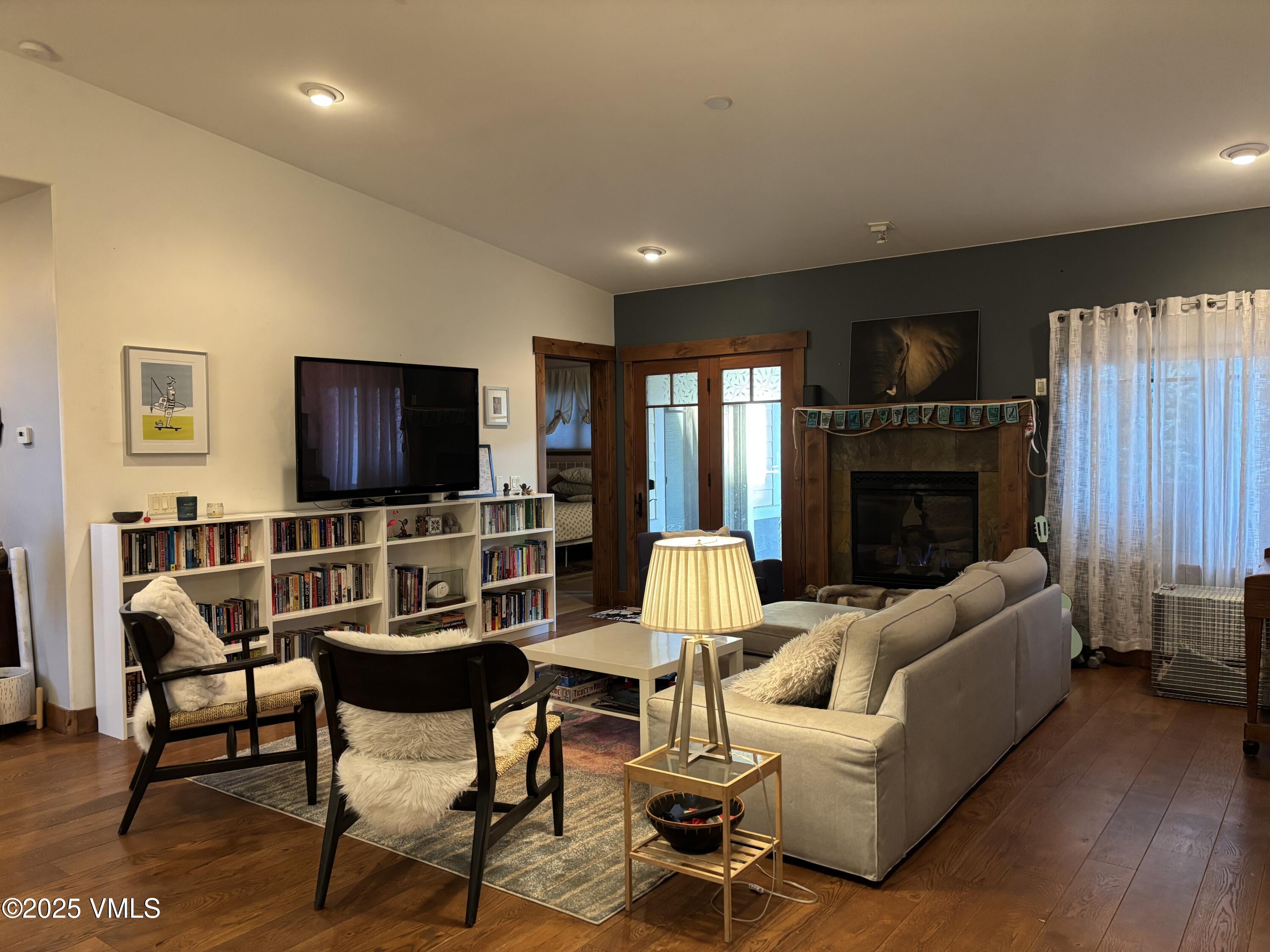 40 Bunker Way Eagle, CO 81631 - Photo 7 of 18 a living room with furniture and a flat screen tv