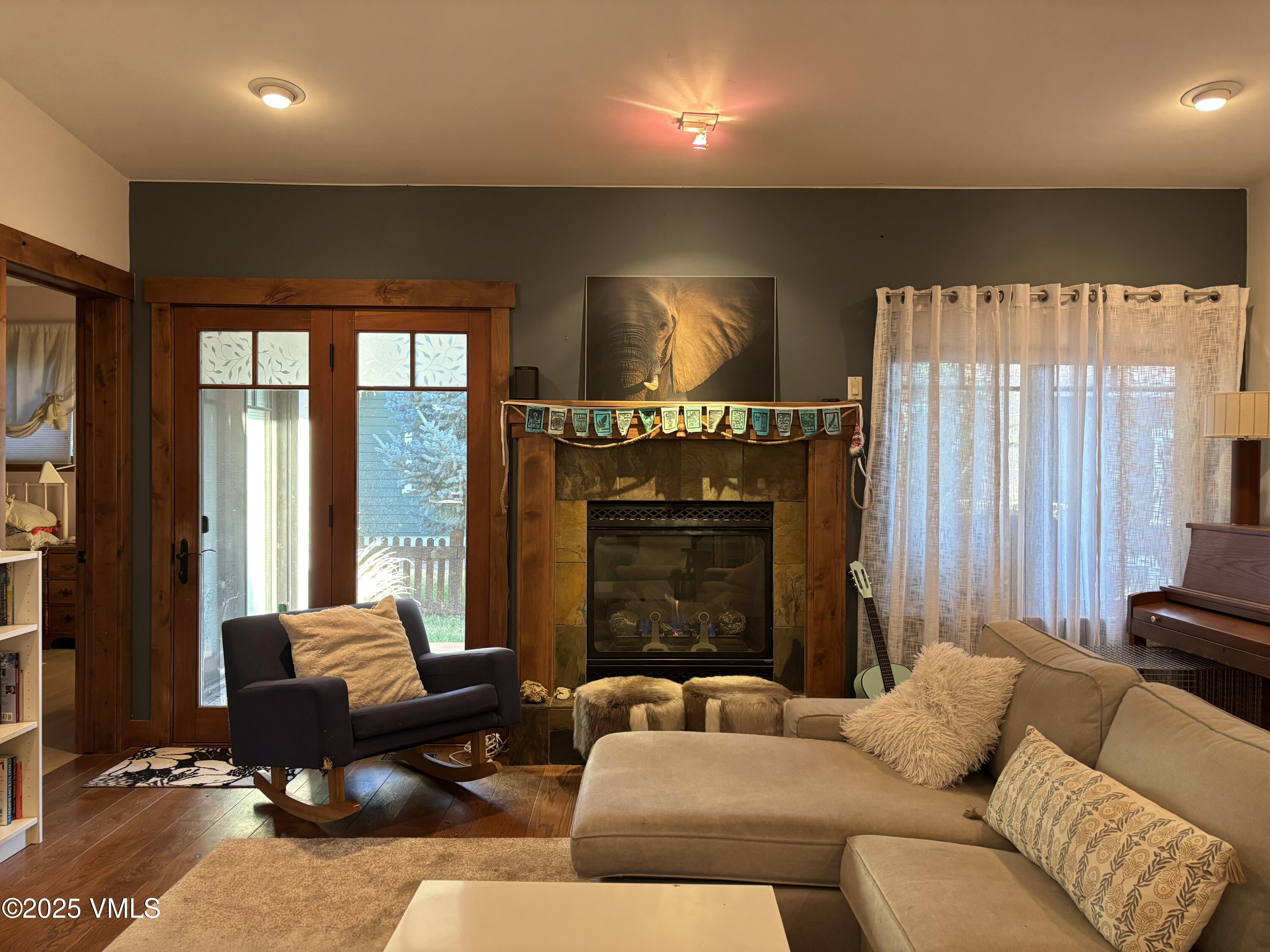 40 Bunker Way Eagle, CO 81631 - Photo 8 of 18 a living room with furniture window and a fireplace