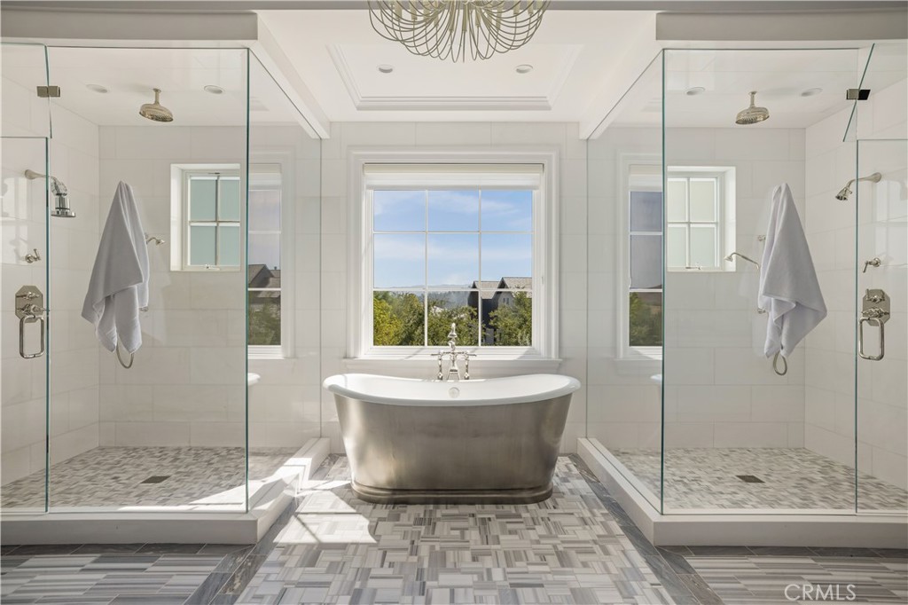 24200 Hidden Ridge Road Hidden Hills, CA 91302 - Photo 24 of 61 a bathroom with a shower