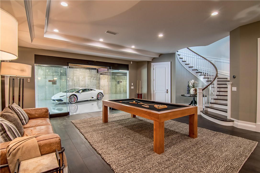 24200 Hidden Ridge Road Hidden Hills, CA 91302 - Photo 45 of 61 a outdoor space with lots of furniture and a rug