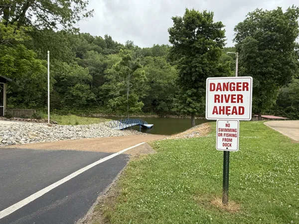 a sign on the side of the road