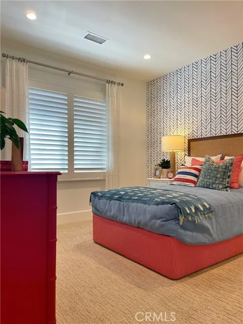 117 Appian Irvine, CA 92602 - Photo 11 of 19 a bedroom with a bed and a window