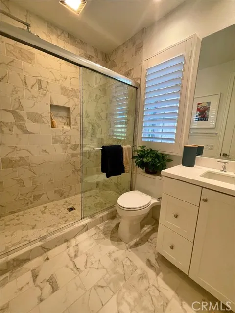 117 Appian Irvine, CA 92602 - Photo 14 of 19 a bathroom with a toilet sink and shower