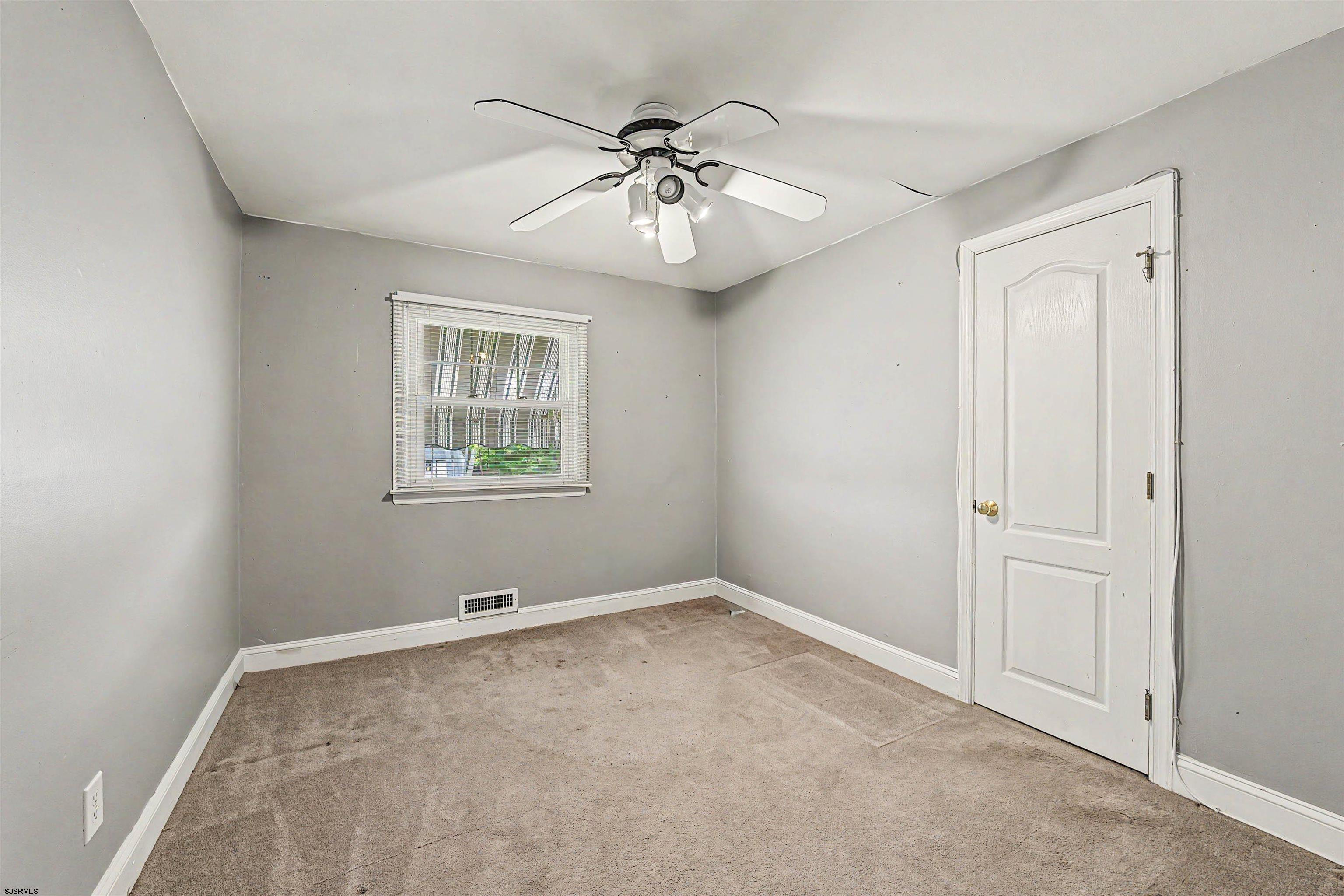 125 Exton Road Somers Point, NJ 08244 - Photo 20 of 35 a view of an empty room with a window