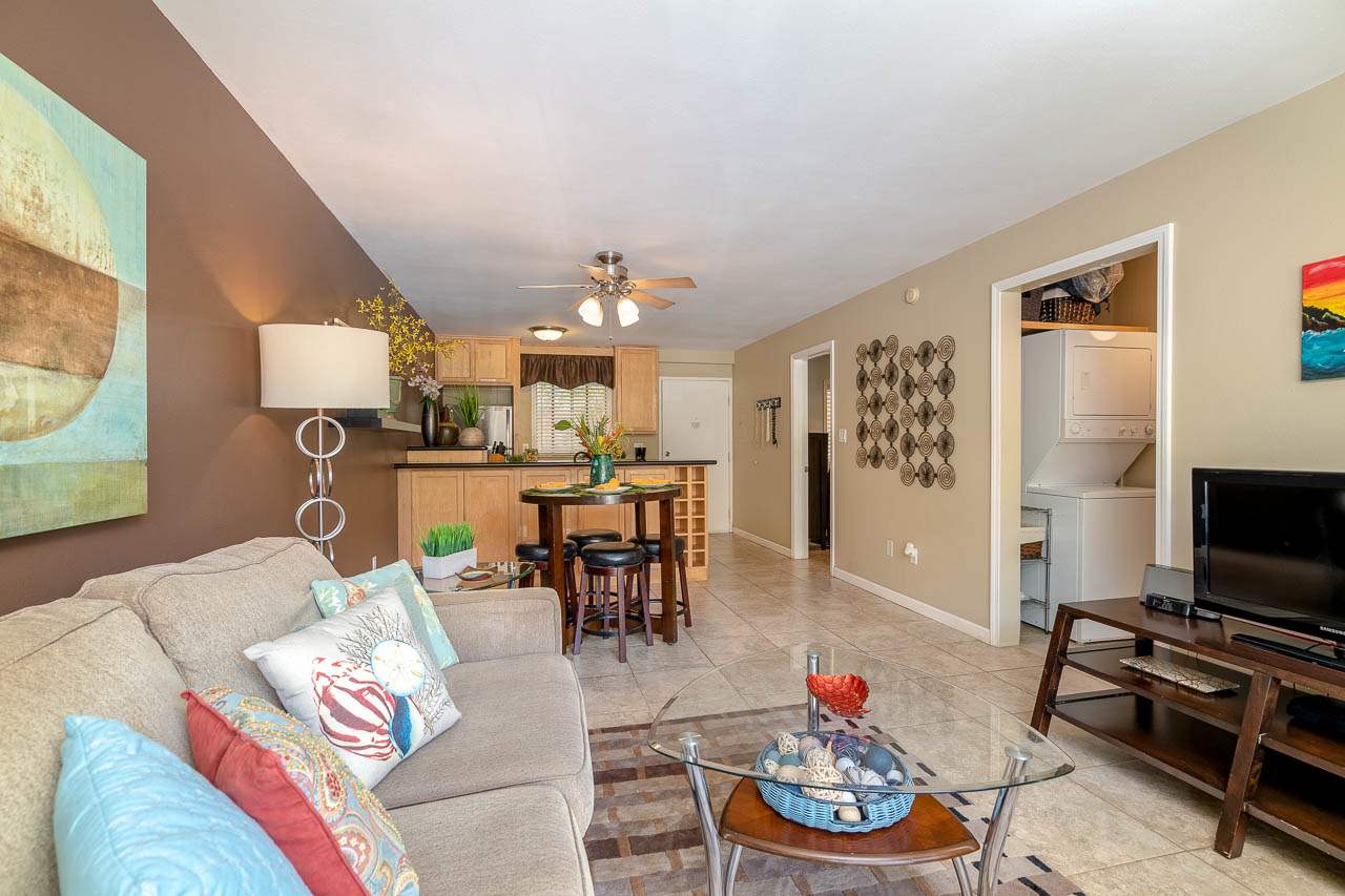 2219 South Kihei Road, Unit B216 Kihei, HI 96753 - Photo 13 of 29 a living room with furniture and a flat screen tv