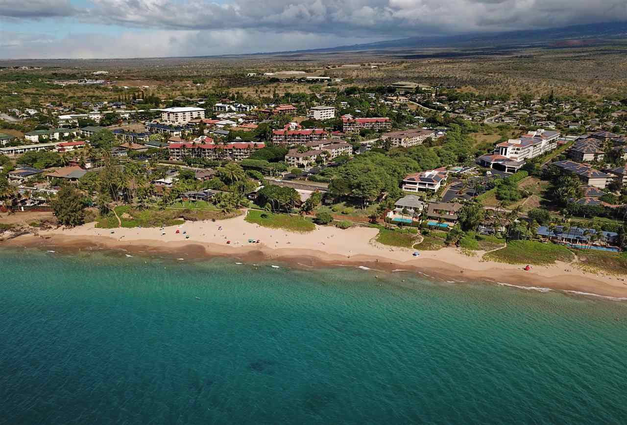 2219 South Kihei Road, Unit B216 Kihei, HI 96753 - Photo 25 of 29 an aerial view of residential houses with outdoor space and trees