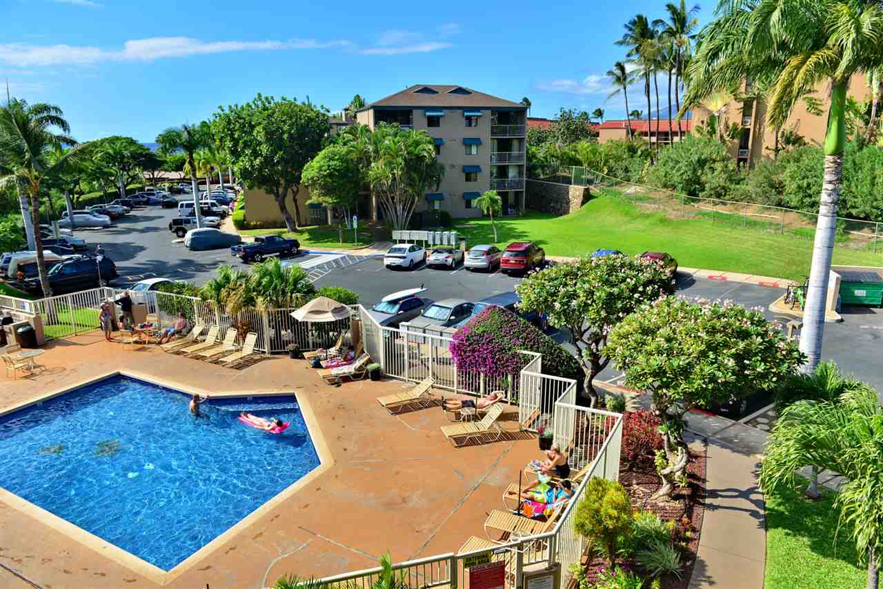 2219 South Kihei Road, Unit B216 Kihei, HI 96753 - Photo 26 of 29 a view of a backyard with plants and patio