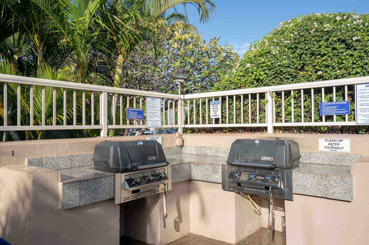 2219 South Kihei Road, Unit B216 Kihei, HI 96753 - Photo 29 of 29 a view of balcony with wooden floor and outdoor seating