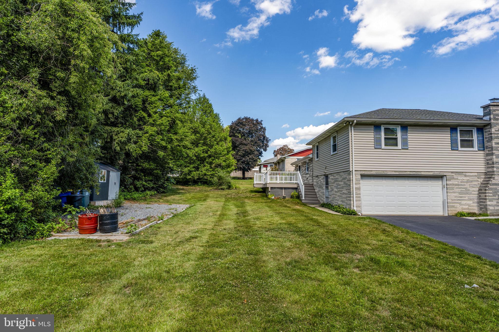 4107 Trowbridge Road York, PA 17402 - Photo 45 of 50 Spacious yard with lush greenery.