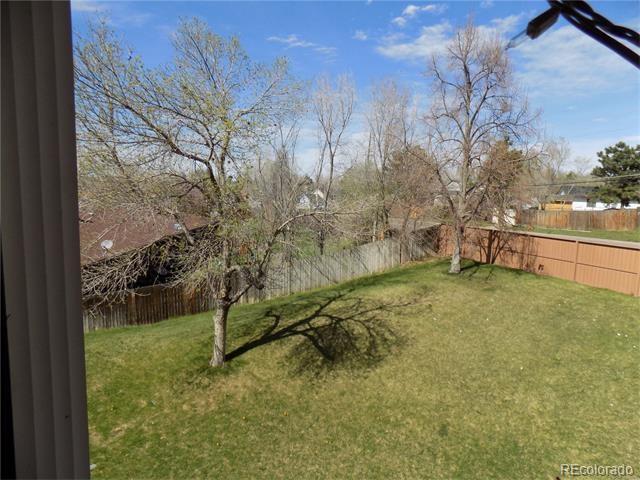 2231 Sable Boulevard, Unit 909 Aurora, CO 80011 - Photo 16 of 16 a view of backyard with trampoline