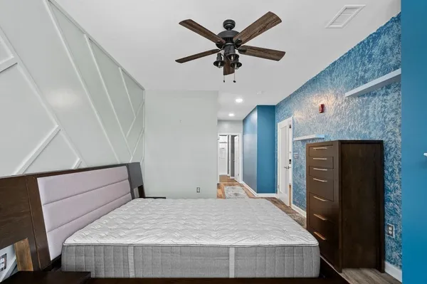 a view of a hallway with a white walls