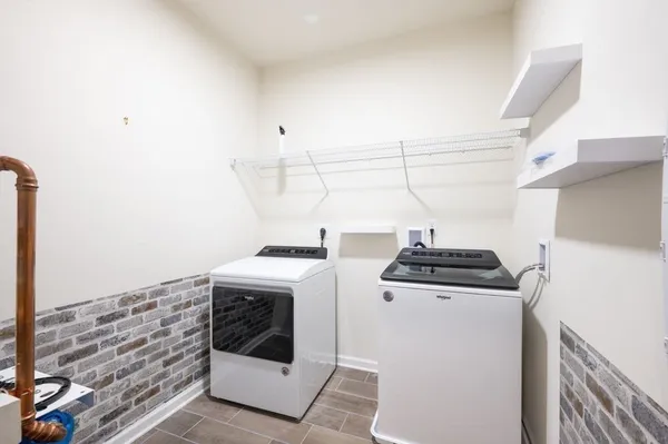 a view of a room with racks on the wall