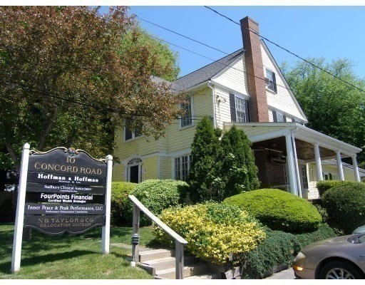 8-10 Concord Road Sudbury, MA 01776 - Photo 2 of 37 front view of a house with a street