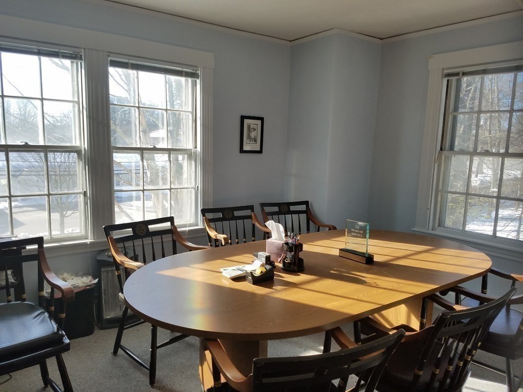 8-10 Concord Road Sudbury, MA 01776 - Photo 22 of 37 a view of a dining room with furniture and window