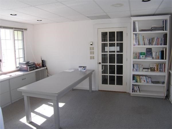8-10 Concord Road Sudbury, MA 01776 - Photo 26 of 37 a living room with furniture and windows