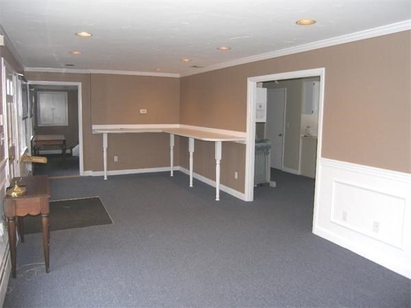 8-10 Concord Road Sudbury, MA 01776 - Photo 29 of 37 a view of an empty room with closet and a window