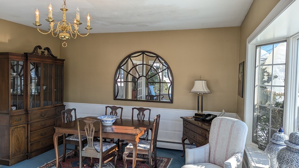 8-10 Concord Road Sudbury, MA 01776 - Photo 32 of 37 a view of a livingroom with furniture and a window