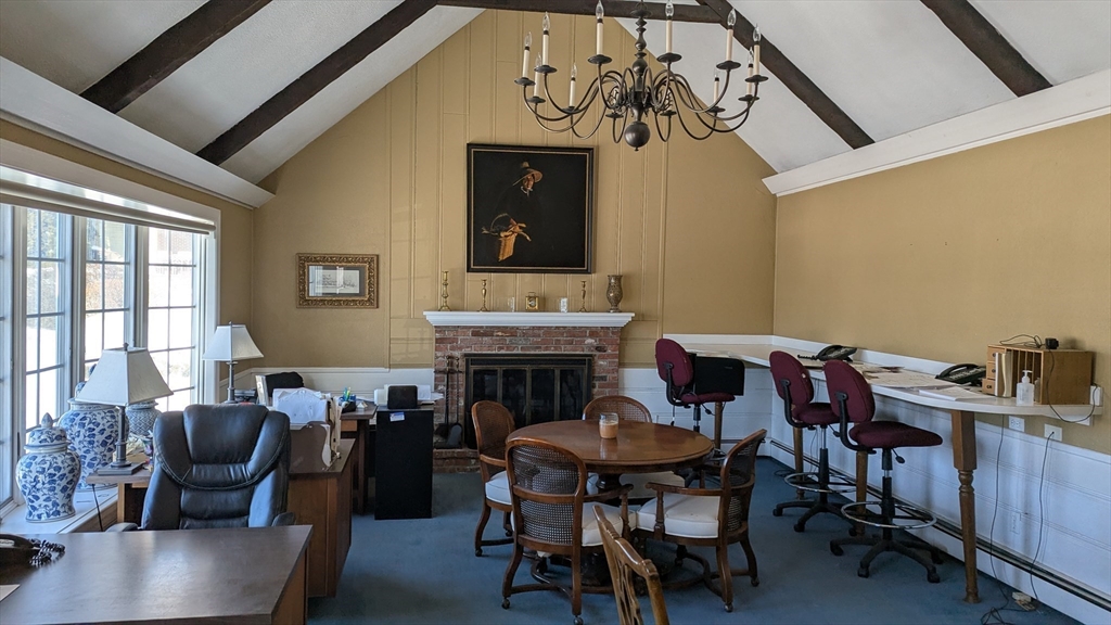 8-10 Concord Road Sudbury, MA 01776 - Photo 33 of 37 a view of a livingroom with furniture and a fireplace