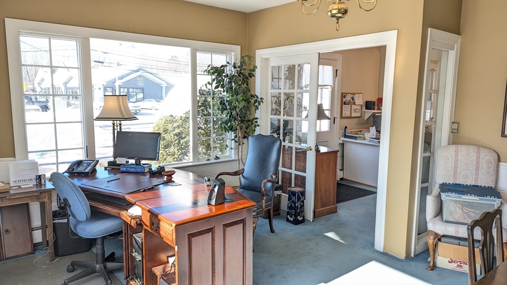 8-10 Concord Road Sudbury, MA 01776 - Photo 35 of 37 a dining room with furniture and window