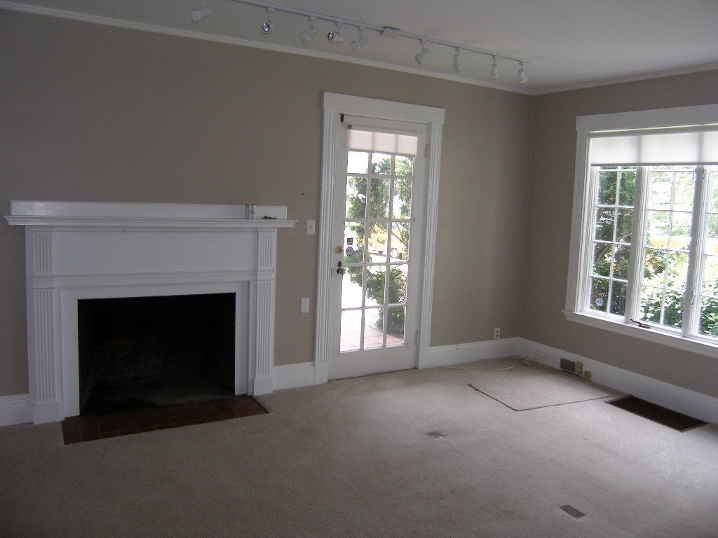 8-10 Concord Road Sudbury, MA 01776 - Photo 8 of 37 a view of empty room with a fireplace