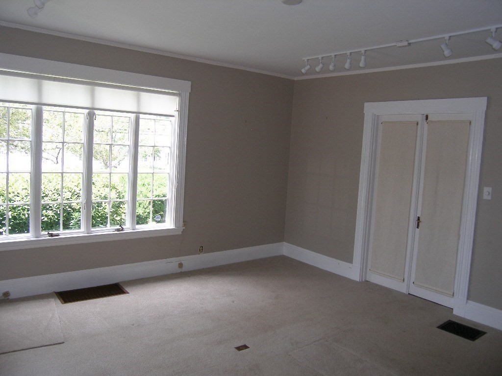 8-10 Concord Road Sudbury, MA 01776 - Photo 10 of 37 an empty room with a window