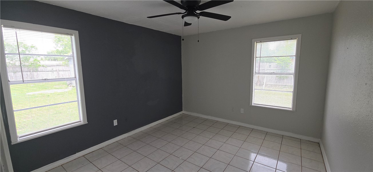 1013 Evergreen Street Mathis, TX 78368 - Photo 2 of 10 a view of an empty room and window