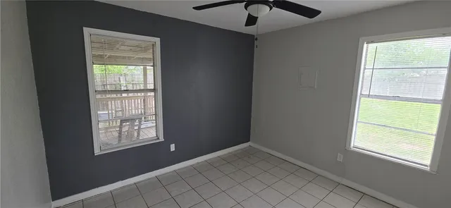 a view of an empty room and window