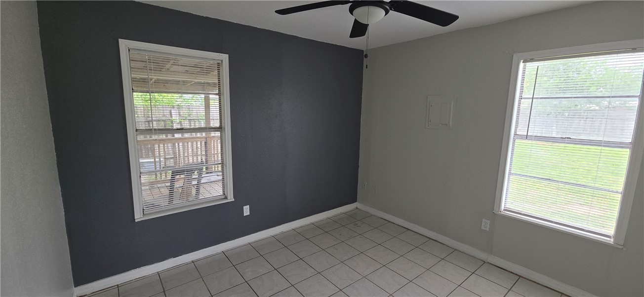 1013 Evergreen Street Mathis, TX 78368 - Photo 4 of 10 a view of an empty room and window