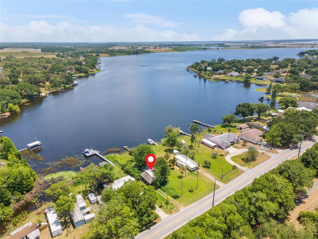 7570 Berkley Road Polk City, FL 33868 - Photo 12 of 16 a view of a lake with a lake view