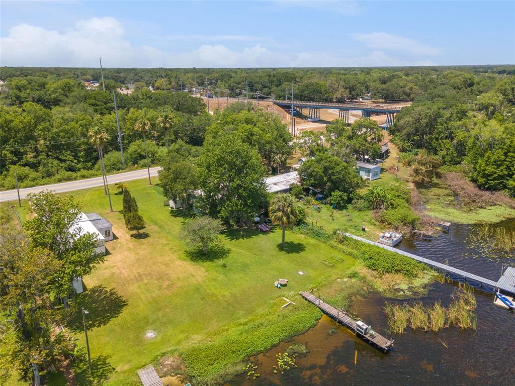 7570 Berkley Road Polk City, FL 33868 - Photo 16 of 16 a view of a lake with a city view