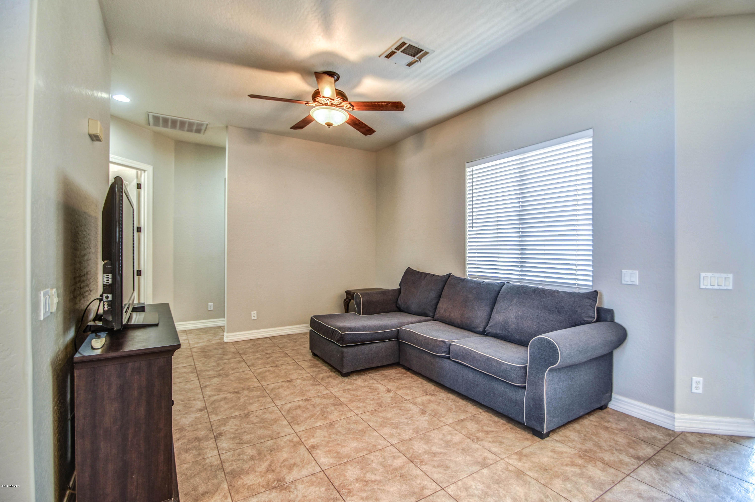 21123 West Sleepy Ranch Road Wittmann, AZ 85361 - Photo 26 of 44 LIVING 1