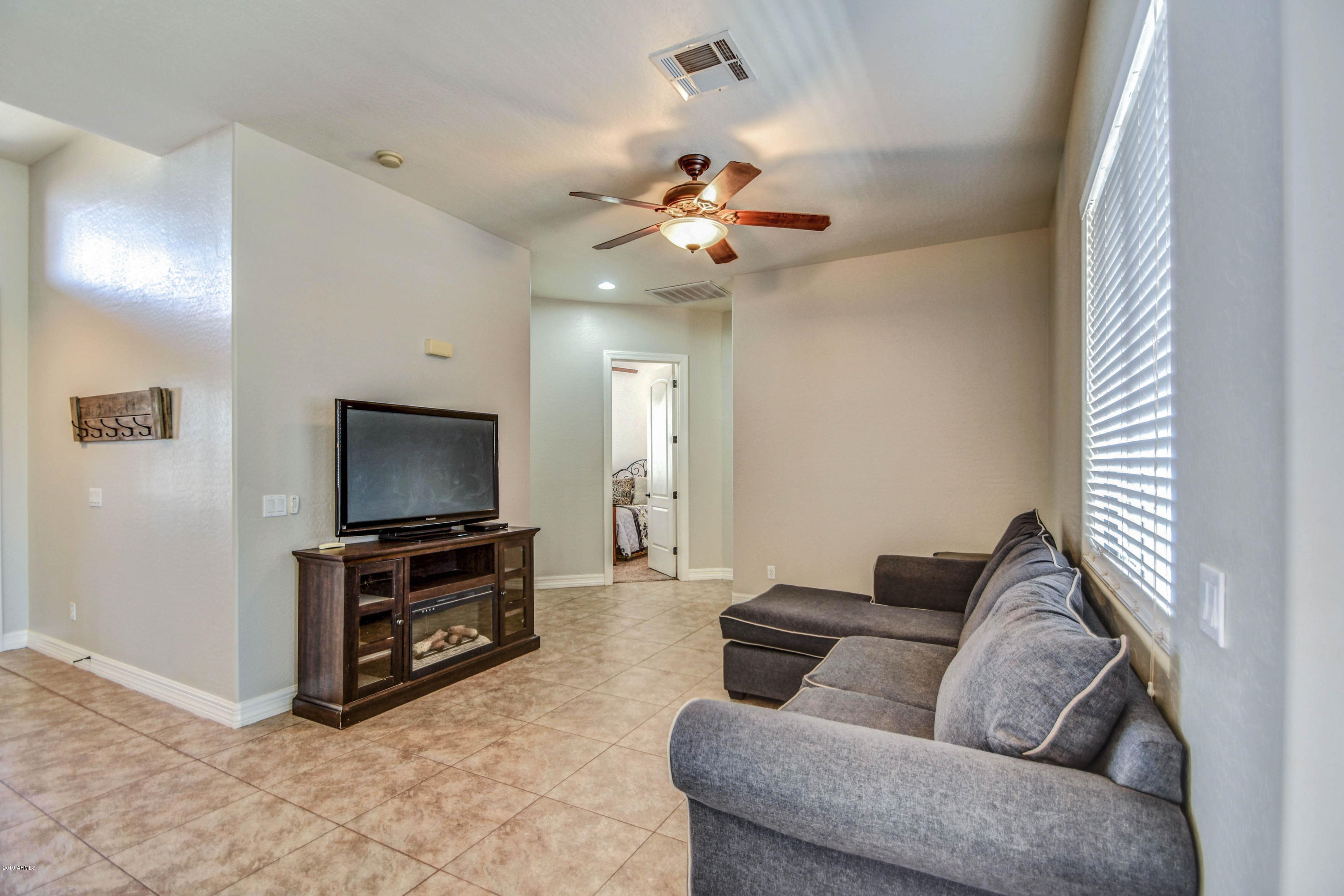 21123 West Sleepy Ranch Road Wittmann, AZ 85361 - Photo 27 of 44 LIVING 2