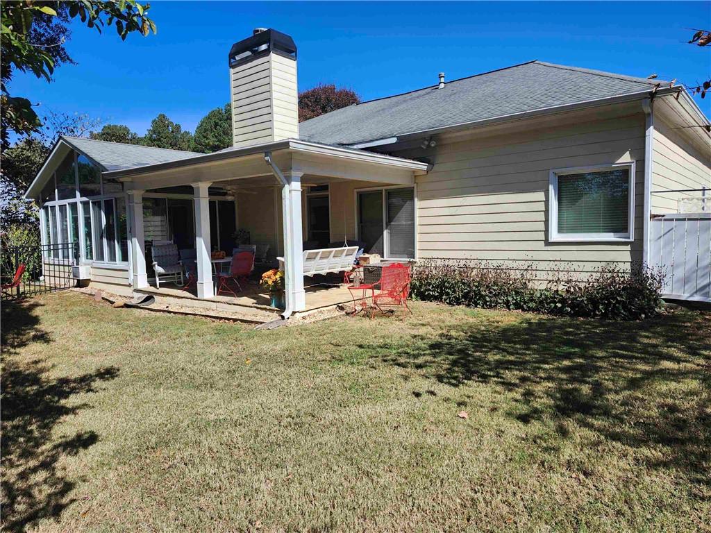 2455 Ridgelake Drive Villa Rica, GA 30180 - Photo 2 of 4 a view of a house with a patio