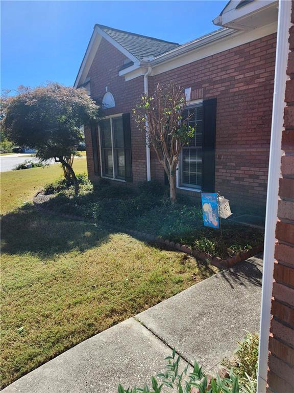 2455 Ridgelake Drive Villa Rica, GA 30180 - Photo 3 of 4 a view of a backyard with plants