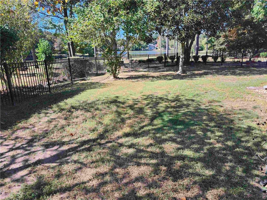 2455 Ridgelake Drive Villa Rica, GA 30180 - Photo 4 of 4 a view of swimming pool with trees