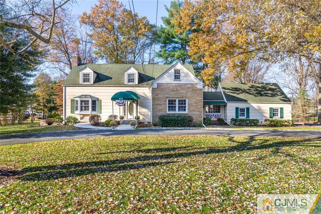 473 Plainfield Road Edison, NJ 08820 - Photo 2 of 28 a front view of a house with swimming pool