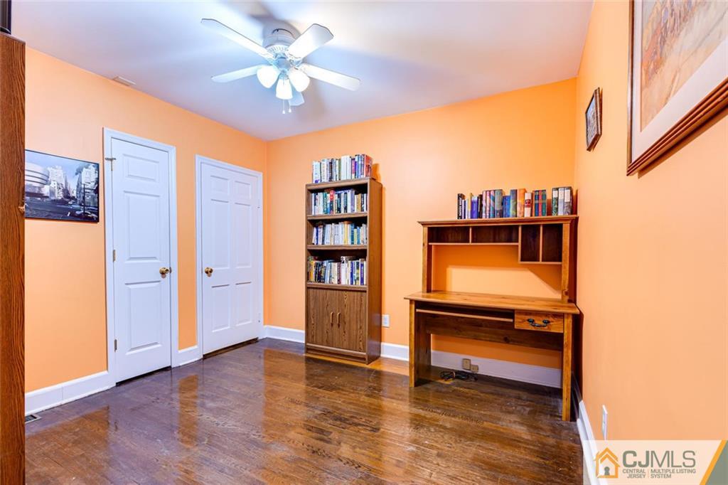 473 Plainfield Road Edison, NJ 08820 - Photo 18 of 28 a living room with furniture and a piano