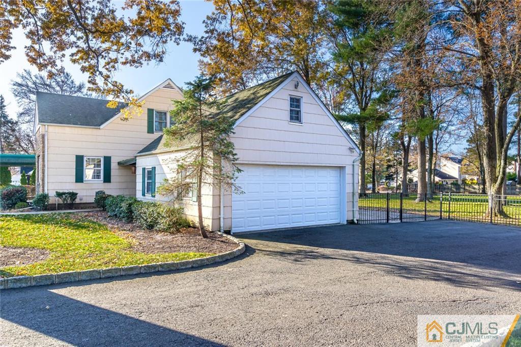 473 Plainfield Road Edison, NJ 08820 - Photo 24 of 28 front view of house with a yard