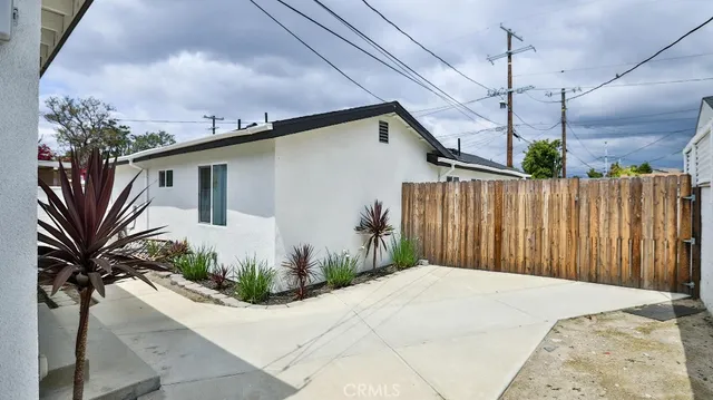 a house view with a backyard space