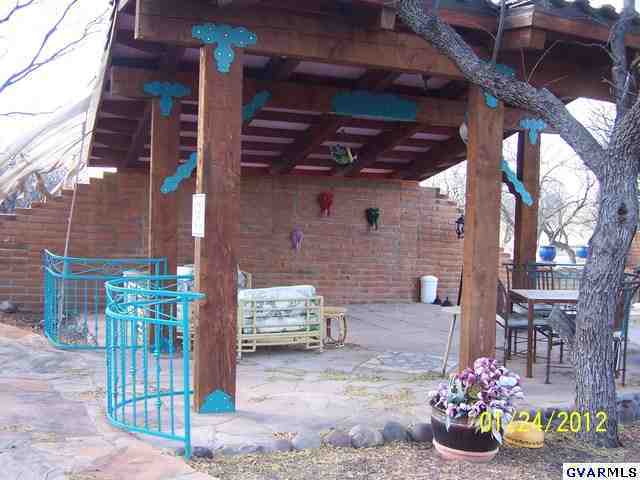 14765 West Jalisco Road Arivaca, AZ 85601 - Photo 17 of 24 a view of a chairs and table in the patio