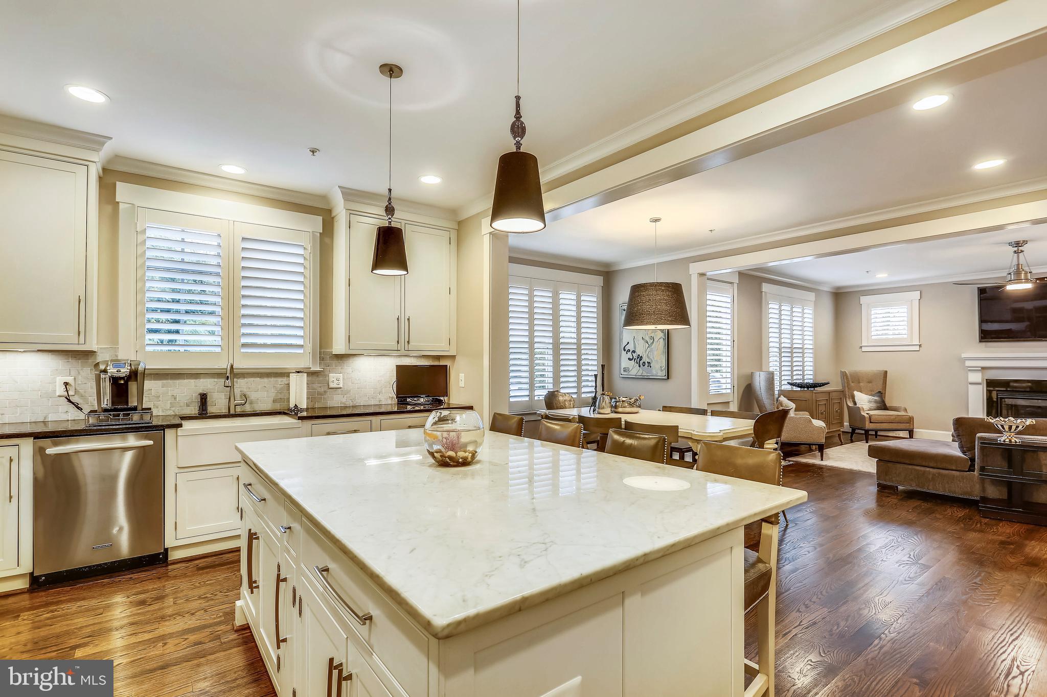 8615 Rayburn Road Bethesda, MD 20817 - Photo 12 of 59 Large Marble Island opens up to family room