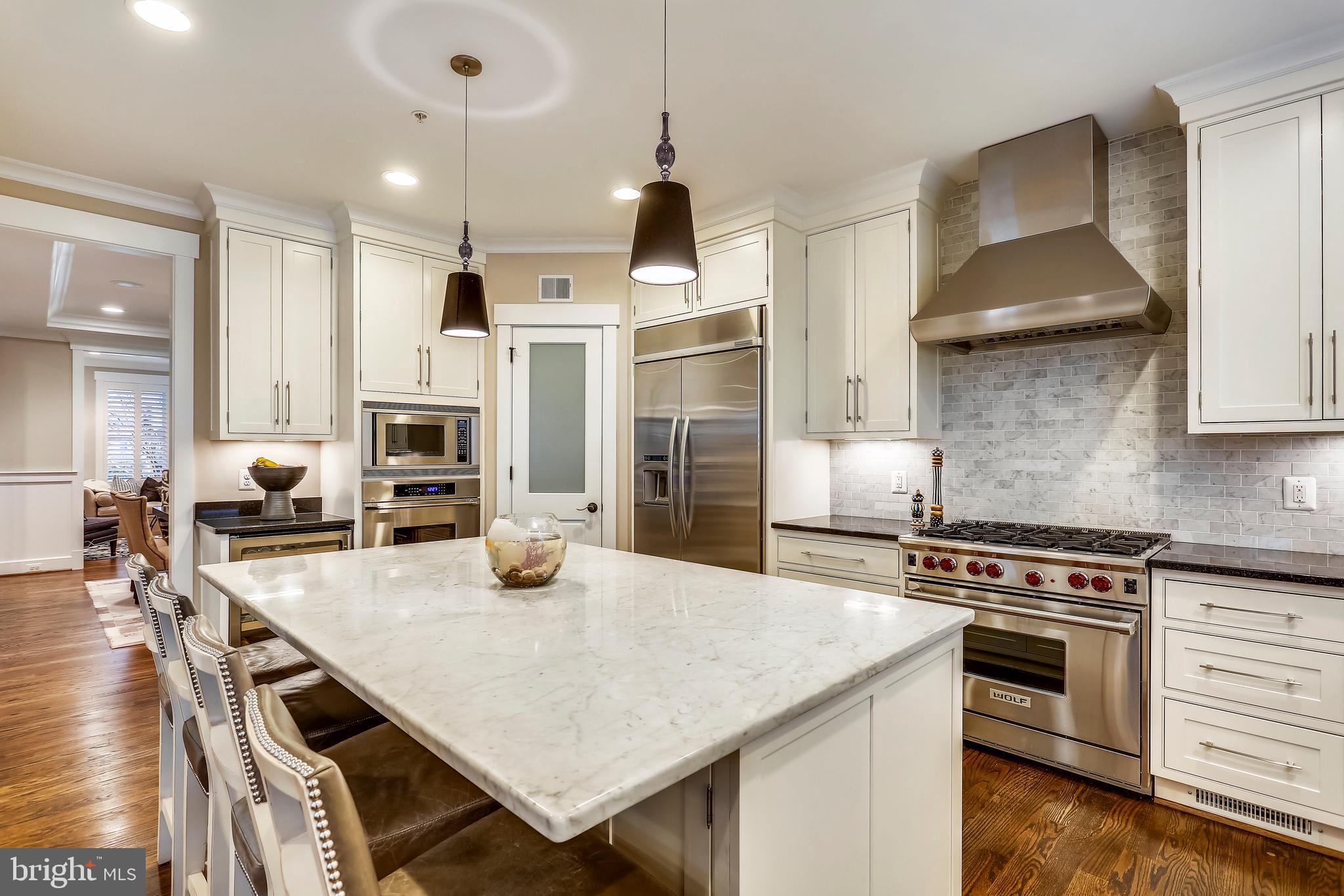 8615 Rayburn Road Bethesda, MD 20817 - Photo 13 of 59 Wolf Range & Hood, Backsplash & Granite counters