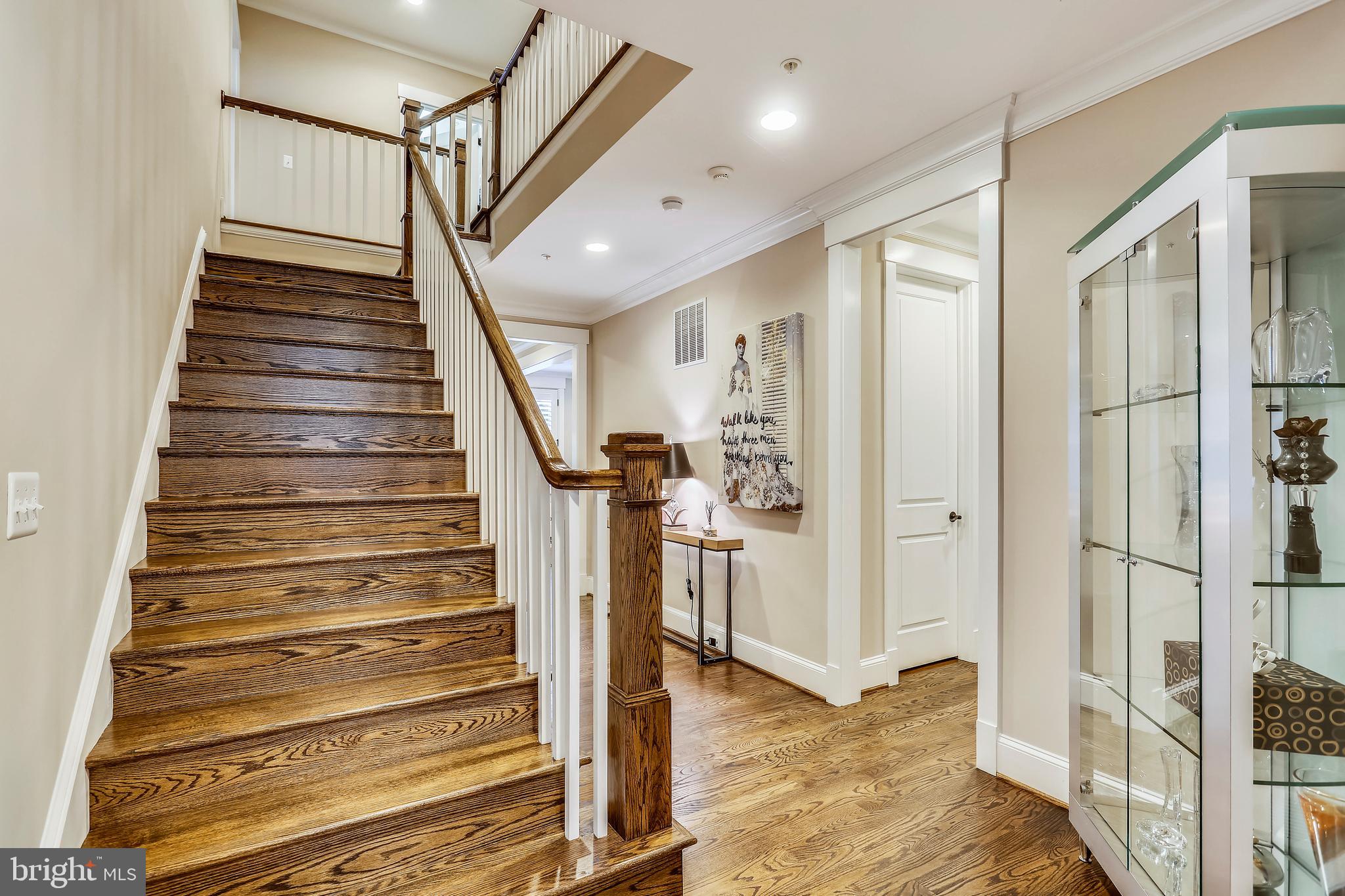8615 Rayburn Road Bethesda, MD 20817 - Photo 23 of 59 Nice hardwood stairs going up to upper level