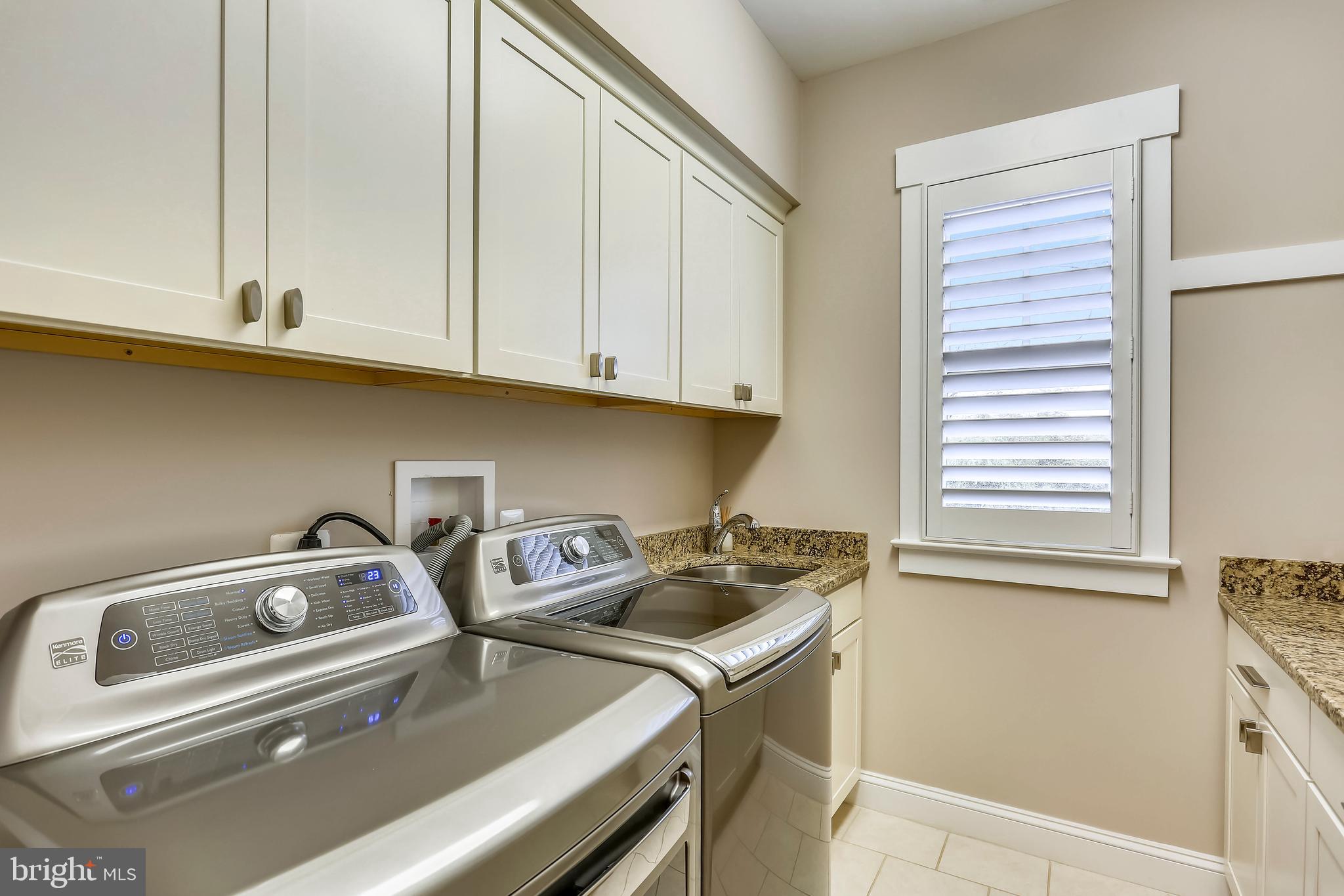 8615 Rayburn Road Bethesda, MD 20817 - Photo 39 of 59 Nice Laundry Room with granite & shaker cabinets
