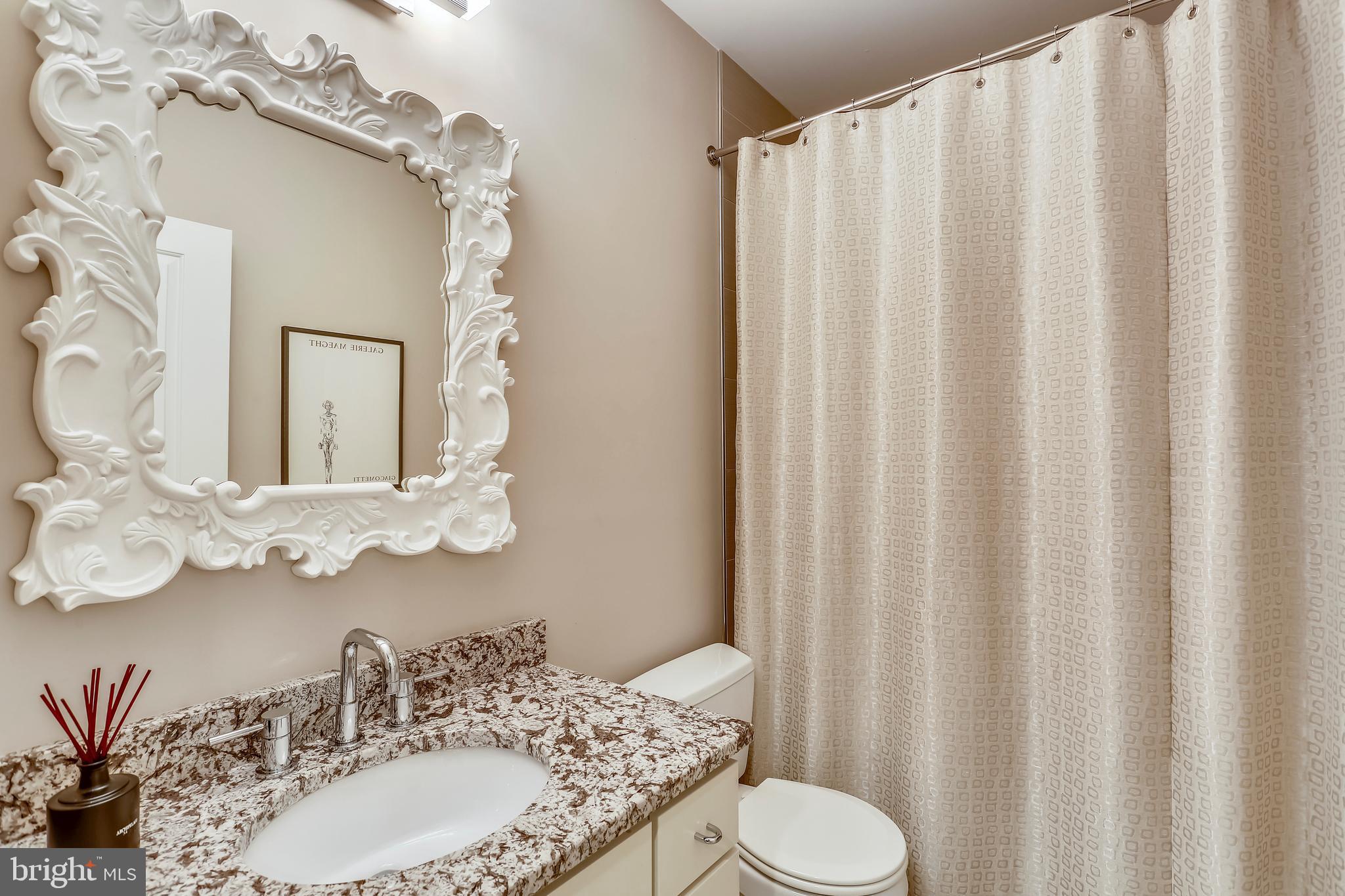 8615 Rayburn Road Bethesda, MD 20817 - Photo 45 of 59 Lower-level full bathroom with granite