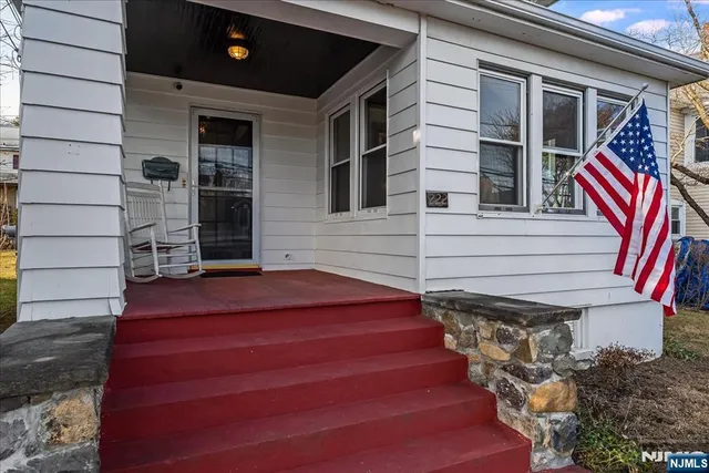 a front view of a house with a balcony