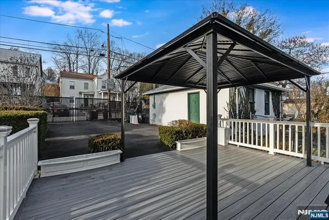 a view of a wooden deck with a patio