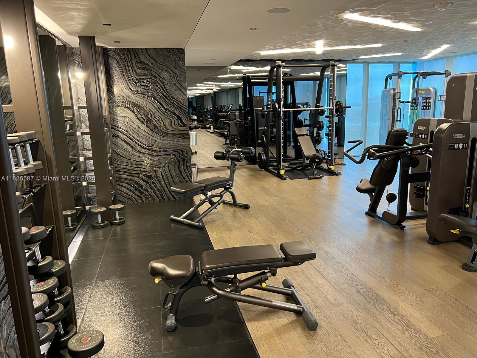 Brickell Miami, FL 33131 - Photo 7 of 23 a view of a room with gym equipment
