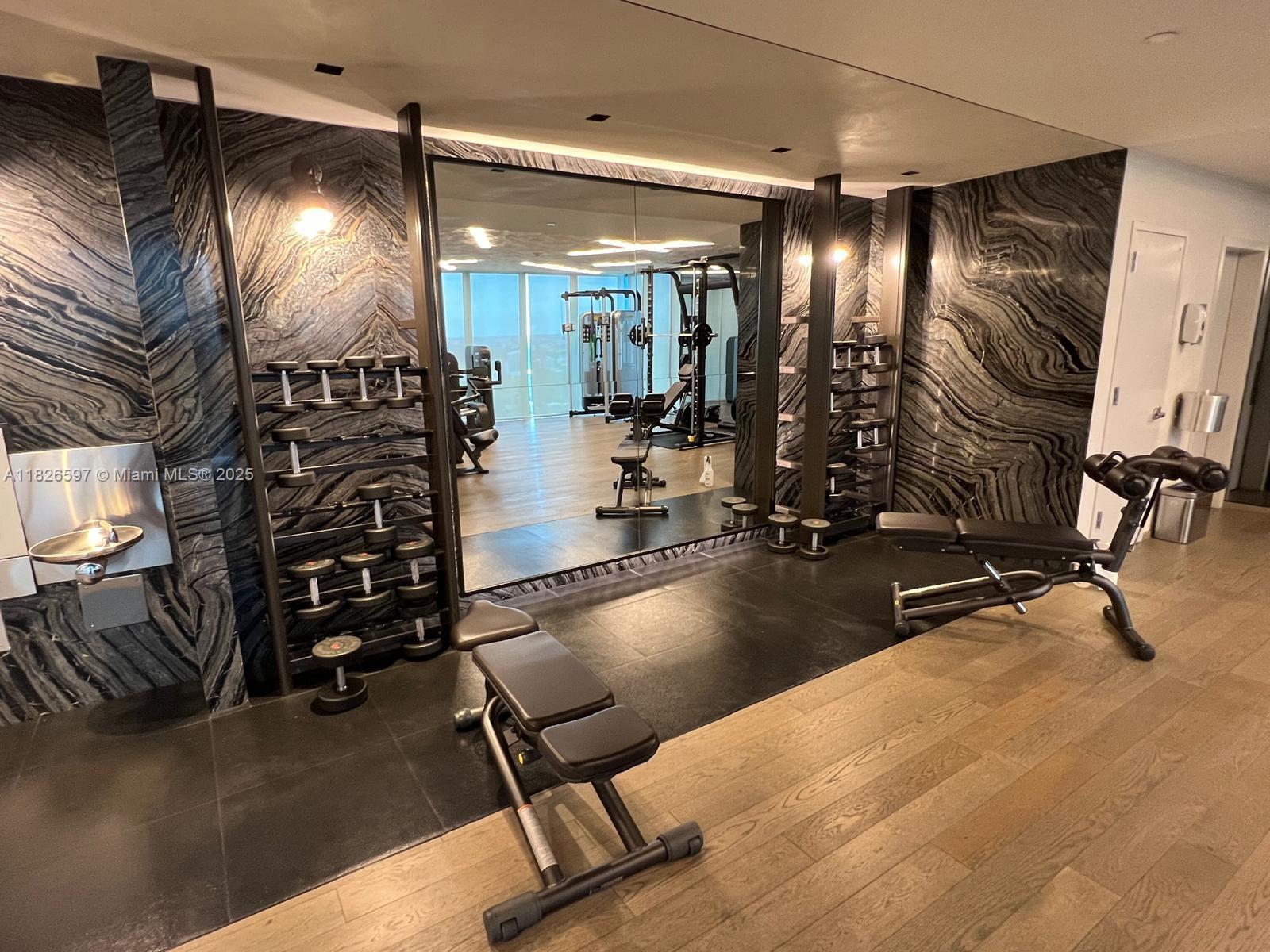 Brickell Miami, FL 33131 - Photo 9 of 23 a view of a room with gym equipment