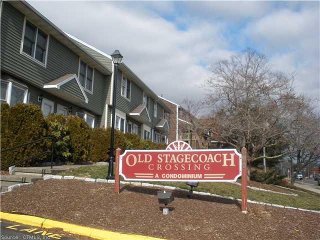 680 North Colony Road, Unit 15 Meriden, CT 06450 - Photo 1 of 1 a street sign on a pole on street
